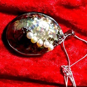 Abalone and pearl pendant.  Striking.